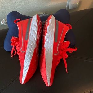 Orange women Nike Reacts running shoes size 7.5